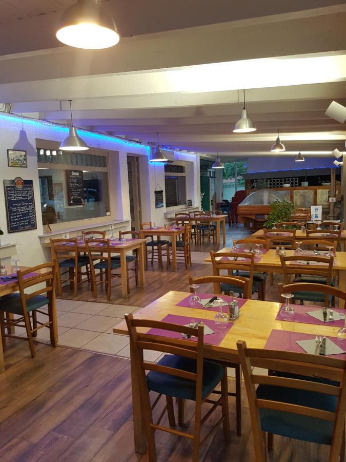 Le Sporting Hotel Beaumont-sur-Leze Buitenkant foto