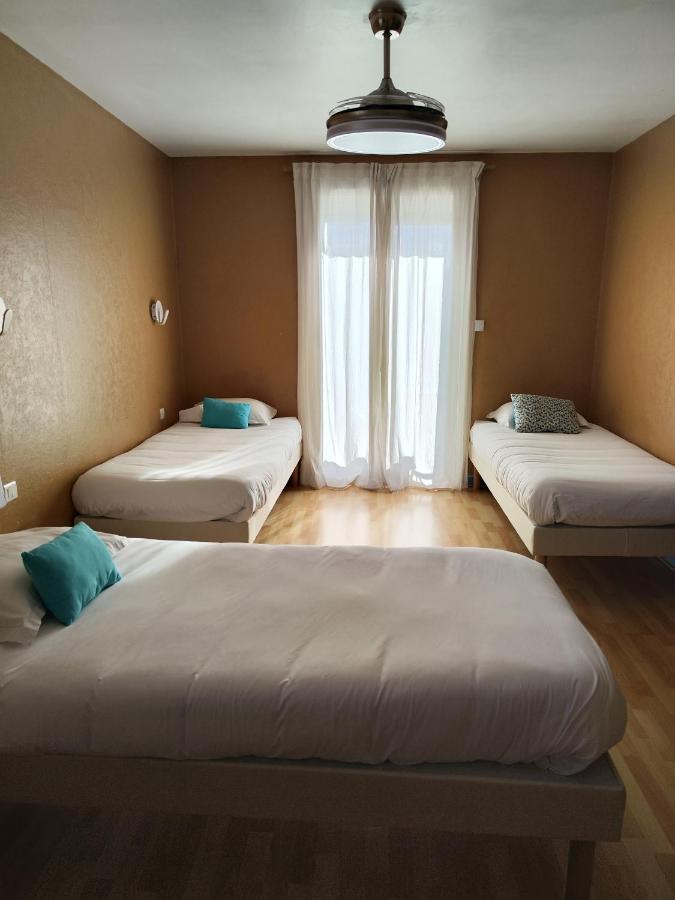 Le Sporting Hotel Beaumont-sur-Leze Buitenkant foto