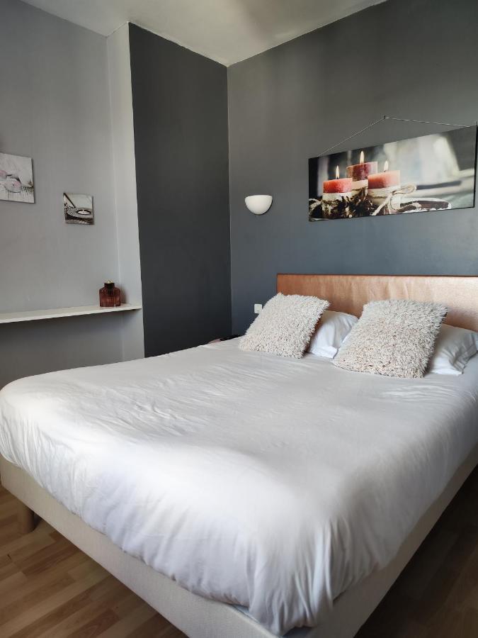 Le Sporting Hotel Beaumont-sur-Leze Buitenkant foto