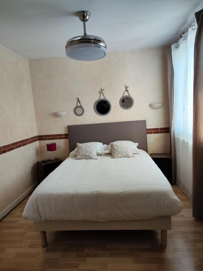 Le Sporting Hotel Beaumont-sur-Leze Buitenkant foto